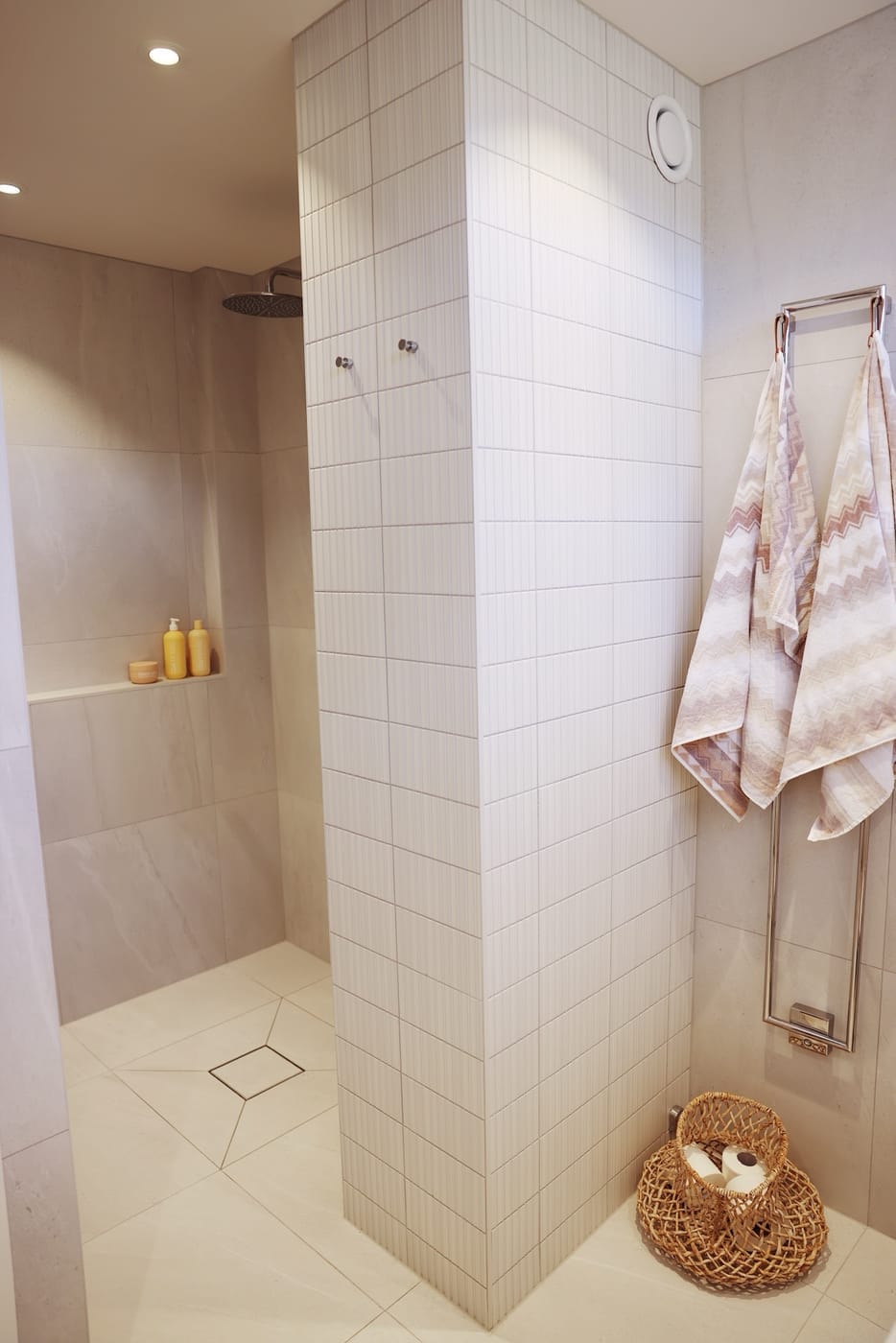 Stilren duschpelare med vit vertikal mosaik och naturstensgolv